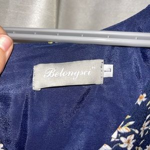 Long sleeve Floral dress with zipper on the back, size L.